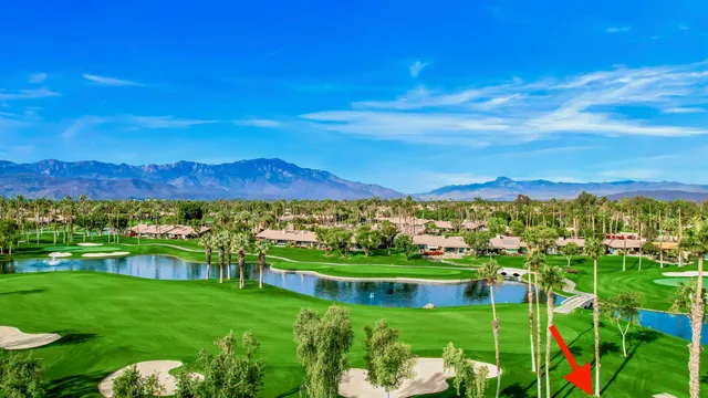 a view of a city with mountains in the background