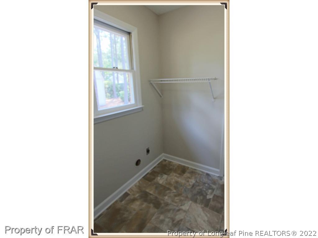 7786 Dragonhead Road Fayetteville, NC 28311 - Photo 12 of 33 a view of a room with a window