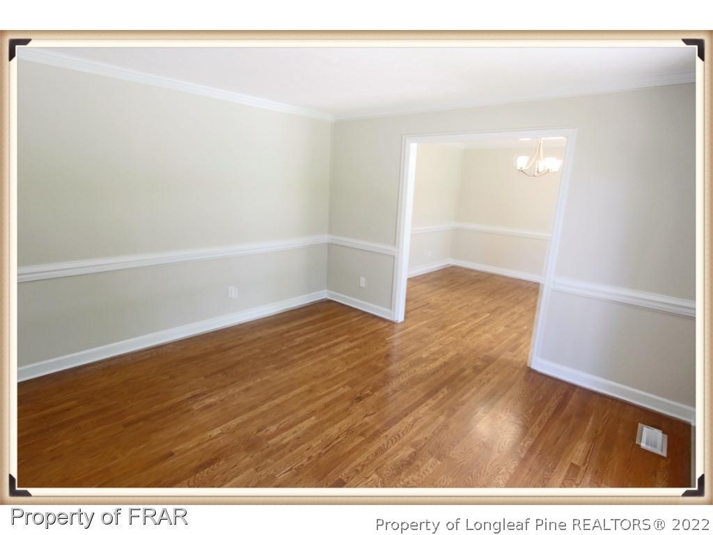 7786 Dragonhead Road Fayetteville, NC 28311 - Photo 4 of 33 a view of a room with wooden floor