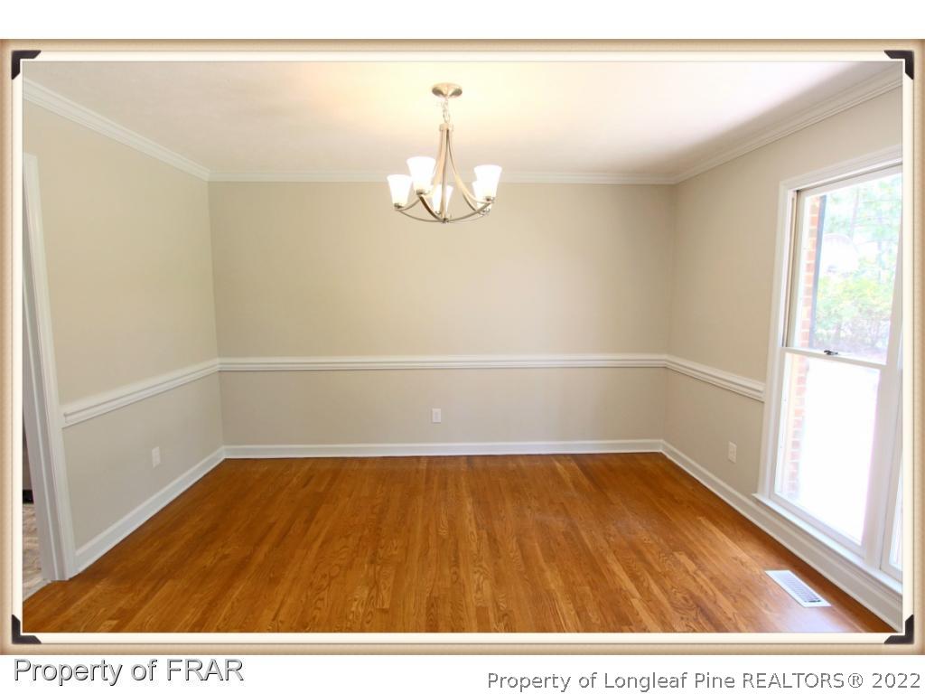 7786 Dragonhead Road Fayetteville, NC 28311 - Photo 5 of 33 a view of an empty room with a window