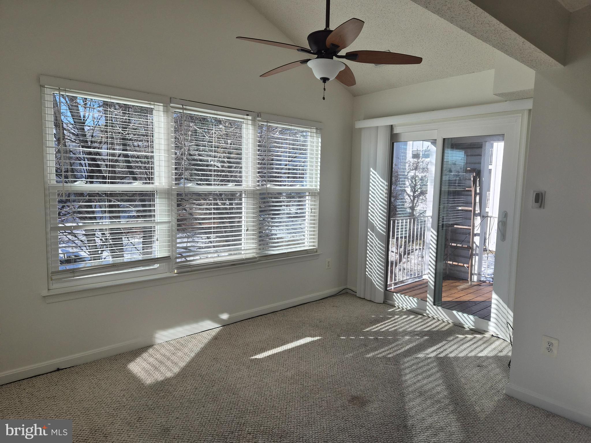 2706 Snowbird Terrace, Unit 1220 Silver Spring, MD 20906 - Photo 11 of 24 a view of an empty room with a window