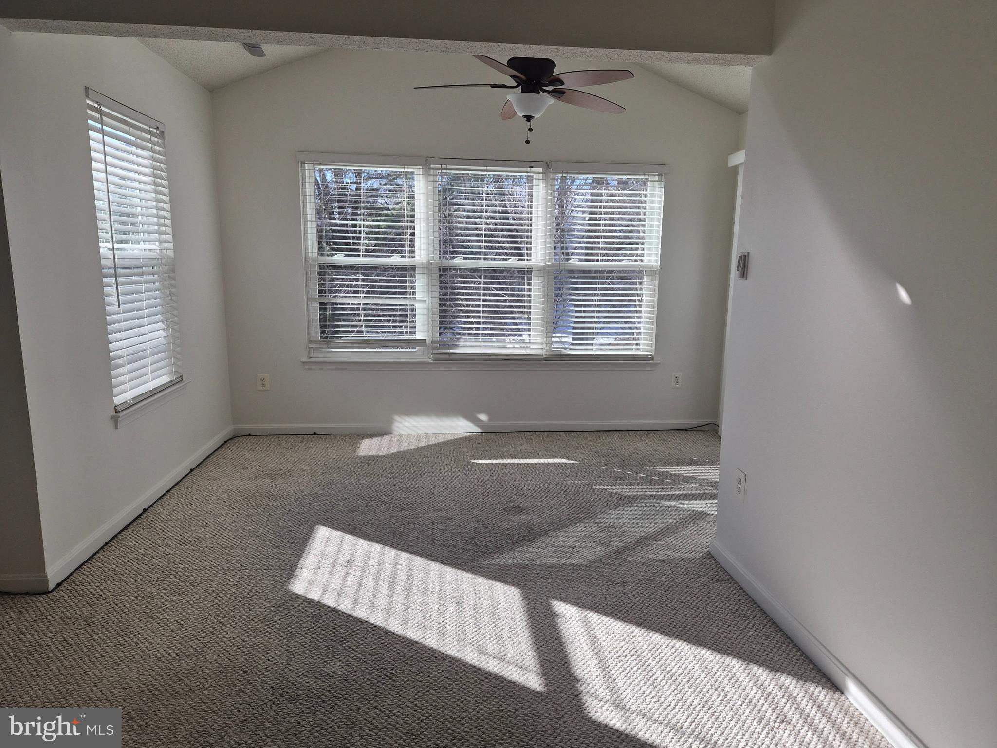 2706 Snowbird Terrace, Unit 1220 Silver Spring, MD 20906 - Photo 12 of 24 a view of an empty room with a window