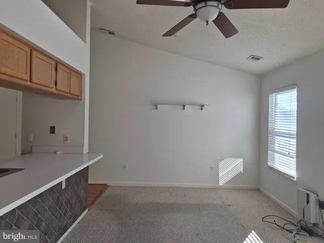 a bathroom with a sink a toilet and a tub