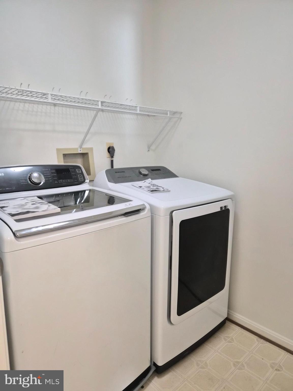 2706 Snowbird Terrace, Unit 1220 Silver Spring, MD 20906 - Photo 16 of 24 a utility room with dryer and washer