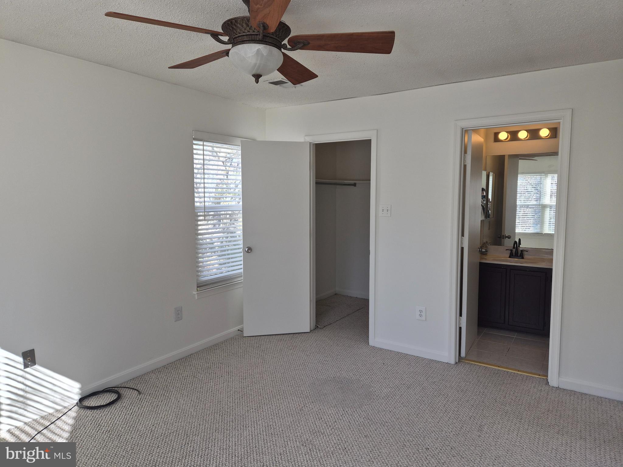 2706 Snowbird Terrace, Unit 1220 Silver Spring, MD 20906 - Photo 17 of 24 a view of an empty room with a window