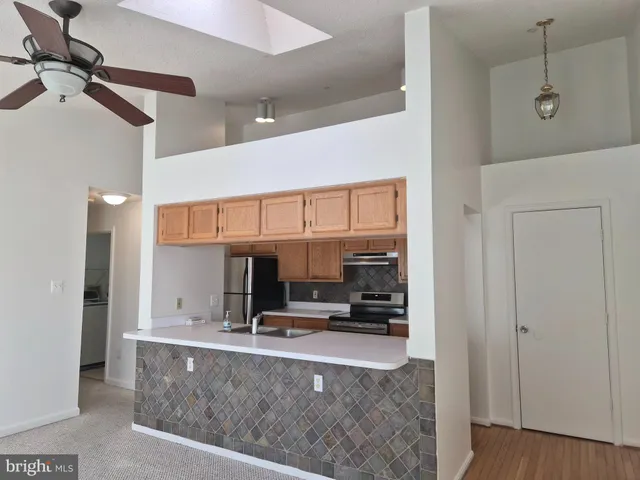 a view of a living room with furniture