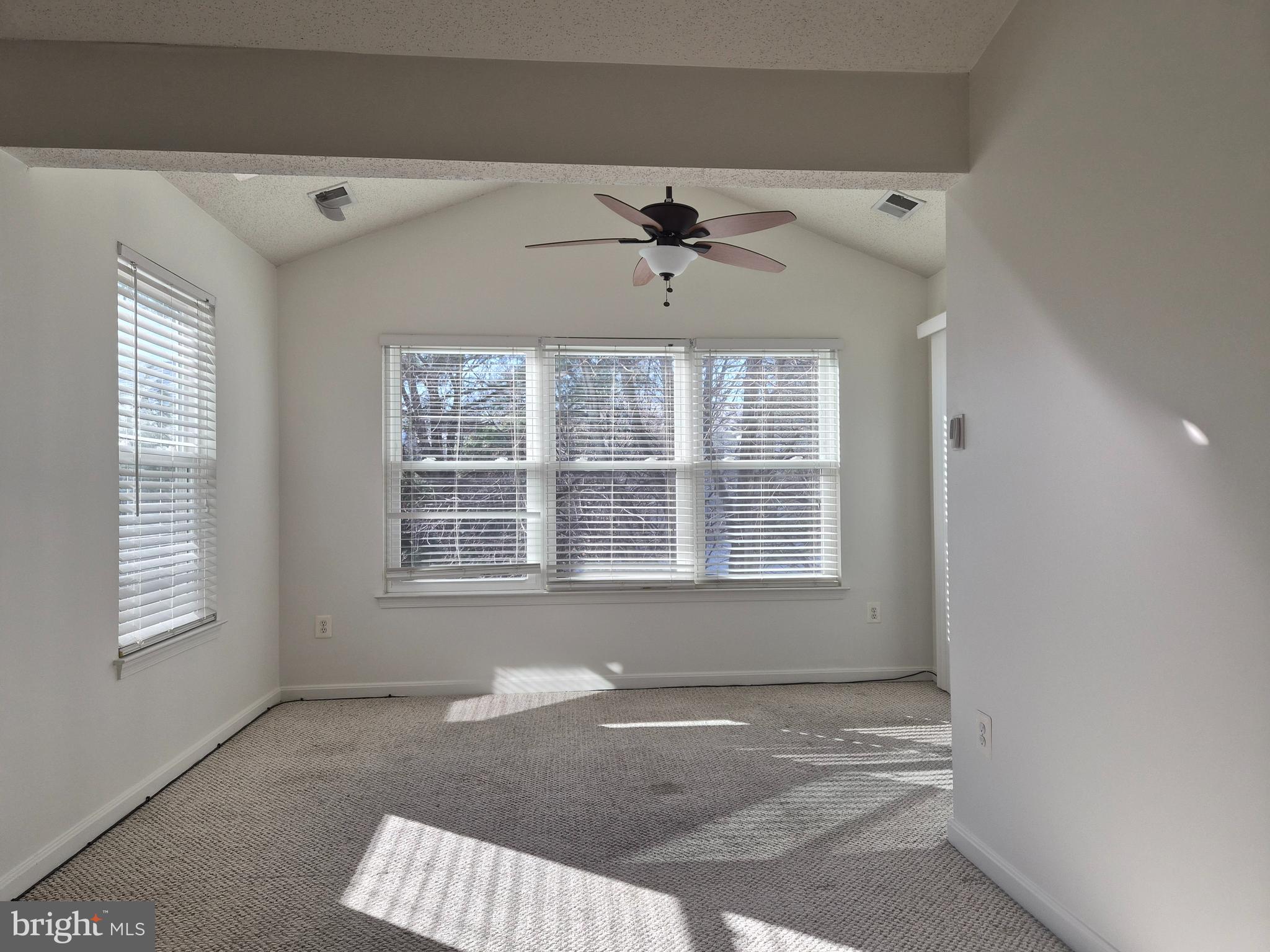 2706 Snowbird Terrace, Unit 1220 Silver Spring, MD 20906 - Photo 8 of 24 a view of an empty room with a window