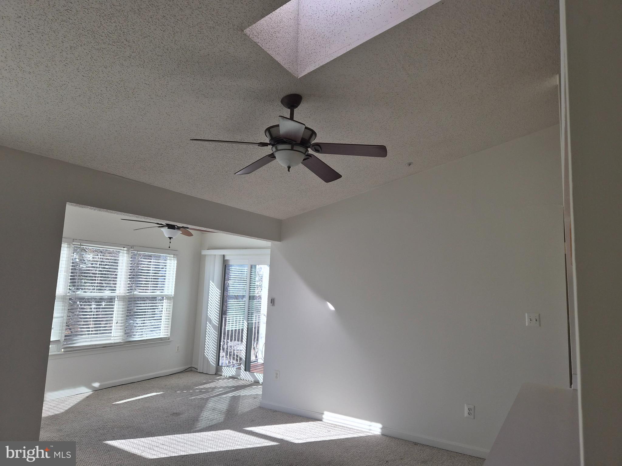 2706 Snowbird Terrace, Unit 1220 Silver Spring, MD 20906 - Photo 9 of 24 a view of an empty room with a window