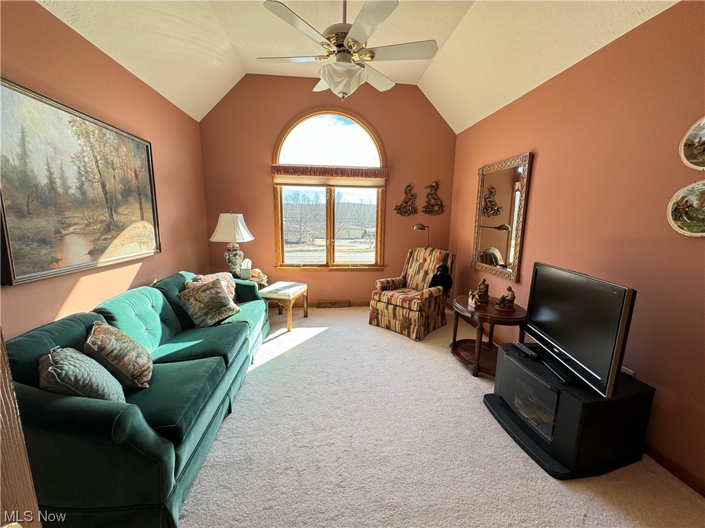 9615 Johnnycake Ridge Road Mentor, OH 44060 - Photo 10 of 35 Upstairs bedroom with carpeted floors, ceiling fan and vaulted ceiling