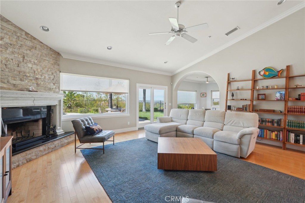 5965 Vía Loma Riverside, CA 92506 - Photo 11 of 41 a living room with furniture fireplace and a large window