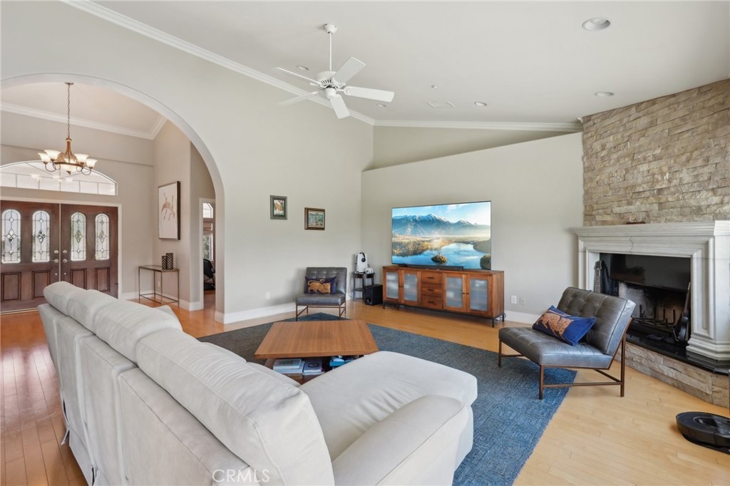 5965 Vía Loma Riverside, CA 92506 - Photo 13 of 41 a living room with furniture and a fireplace