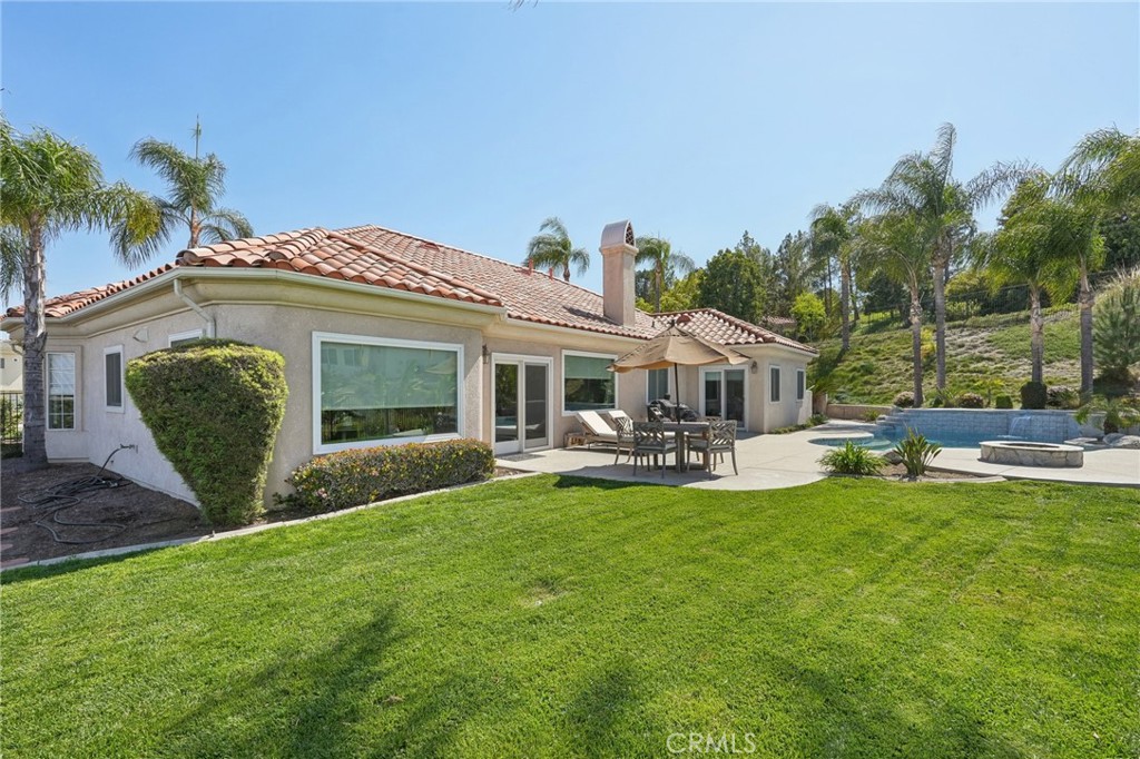 5965 Vía Loma Riverside, CA 92506 - Photo 37 of 41 a view of a house with backyard porch and sitting area