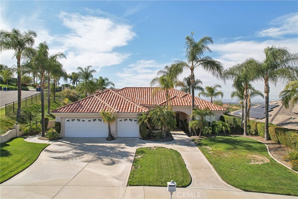 5965 Vía Loma Riverside, CA 92506 - Photo 4 of 41 a view of a house with a yard and sitting area
