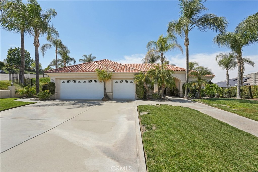 5965 Vía Loma Riverside, CA 92506 - Photo 7 of 41 a front view of a building with palm trees