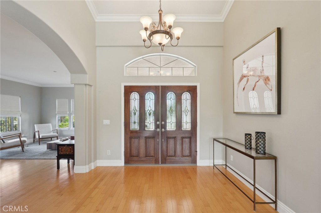 5965 Vía Loma Riverside, CA 92506 - Photo 10 of 41 a view of an entryway with wooden floor