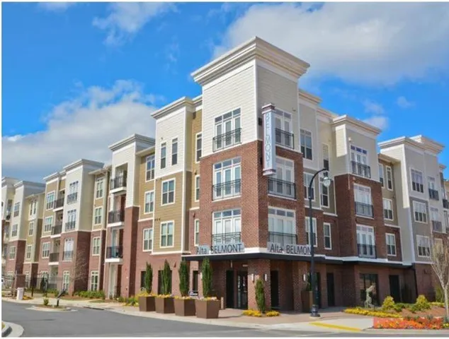 a front view of a building with a street
