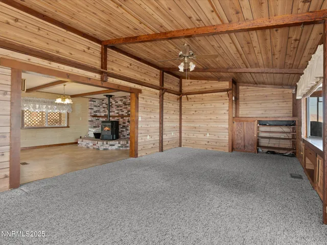 a bathroom with a sink mirror and tub