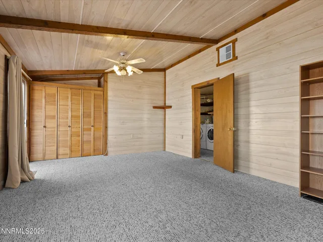a bathroom with a sink double vanity mirror and a bathtub