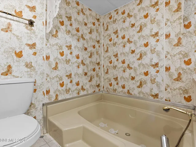 a view of a balcony with wooden floor