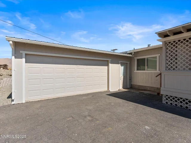 a view of outdoor space with wooden floor