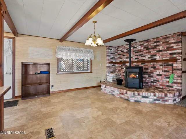 a kitchen with stainless steel appliances granite countertop a stove and a sink