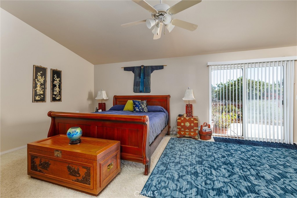 535 Charro Way Nipomo, CA 93444 - Photo 13 of 34 a bedroom with a bed and window