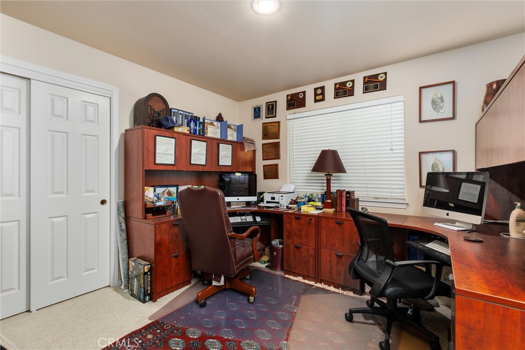 535 Charro Way Nipomo, CA 93444 - Photo 18 of 34 a view of a workspace with furniture and a window