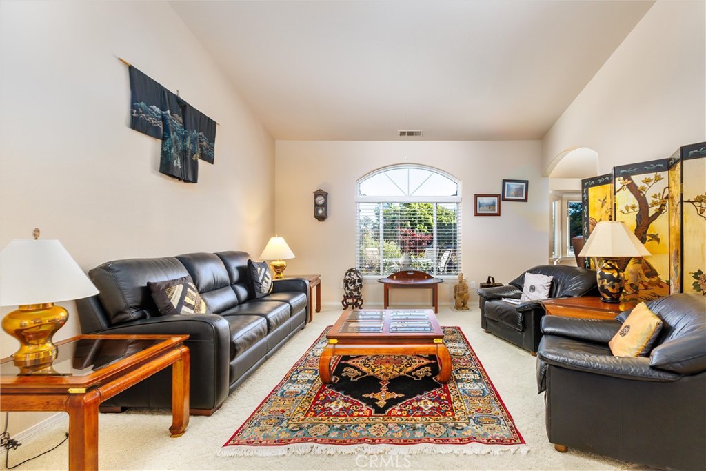 535 Charro Way Nipomo, CA 93444 - Photo 4 of 34 a living room with furniture a rug and a large window