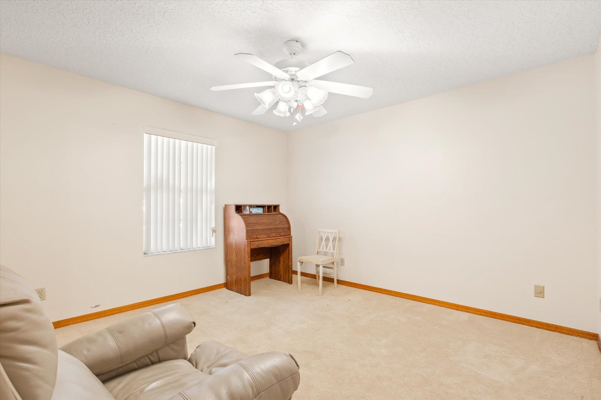 913 Chippewa Street St. Augustine, FL 32086 - Photo 29 of 56 a living room with furniture and a window