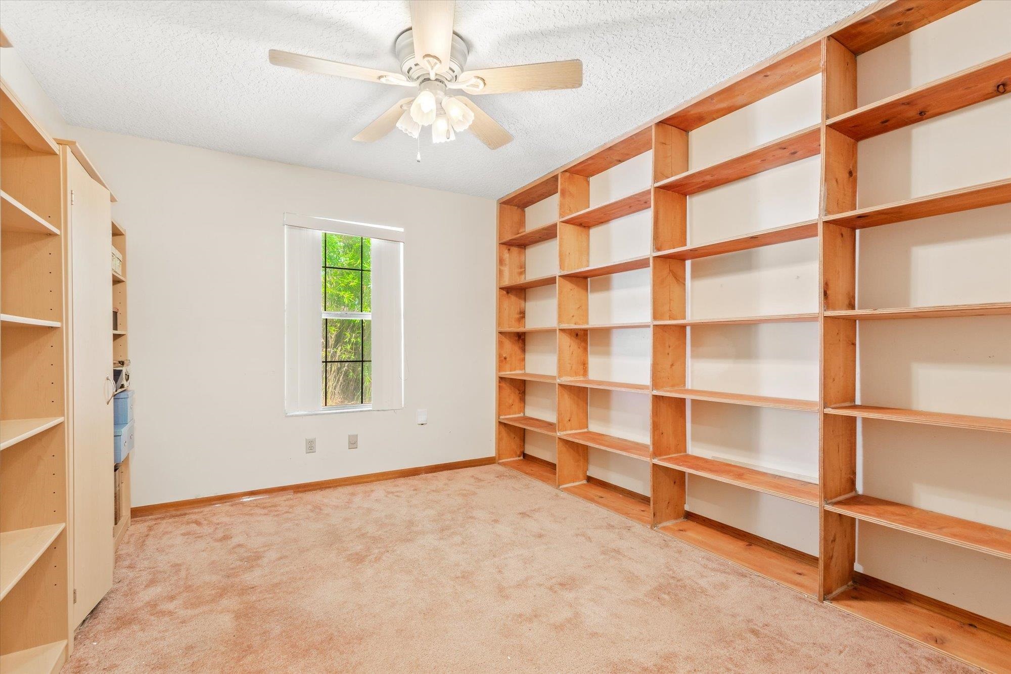 913 Chippewa Street St. Augustine, FL 32086 - Photo 30 of 56 a view of an empty room with a window