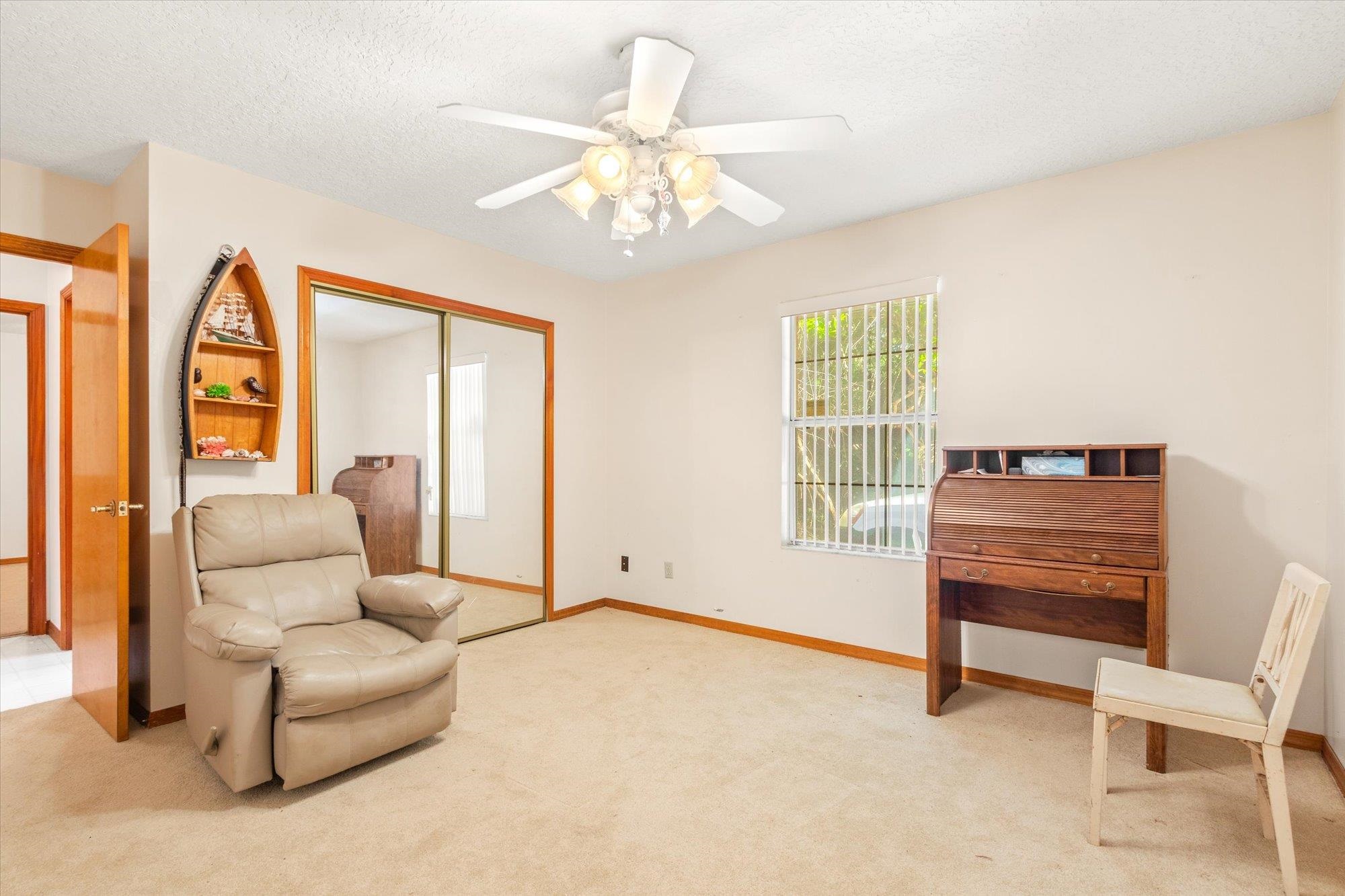 913 Chippewa Street St. Augustine, FL 32086 - Photo 31 of 56 a living room with furniture and a large window
