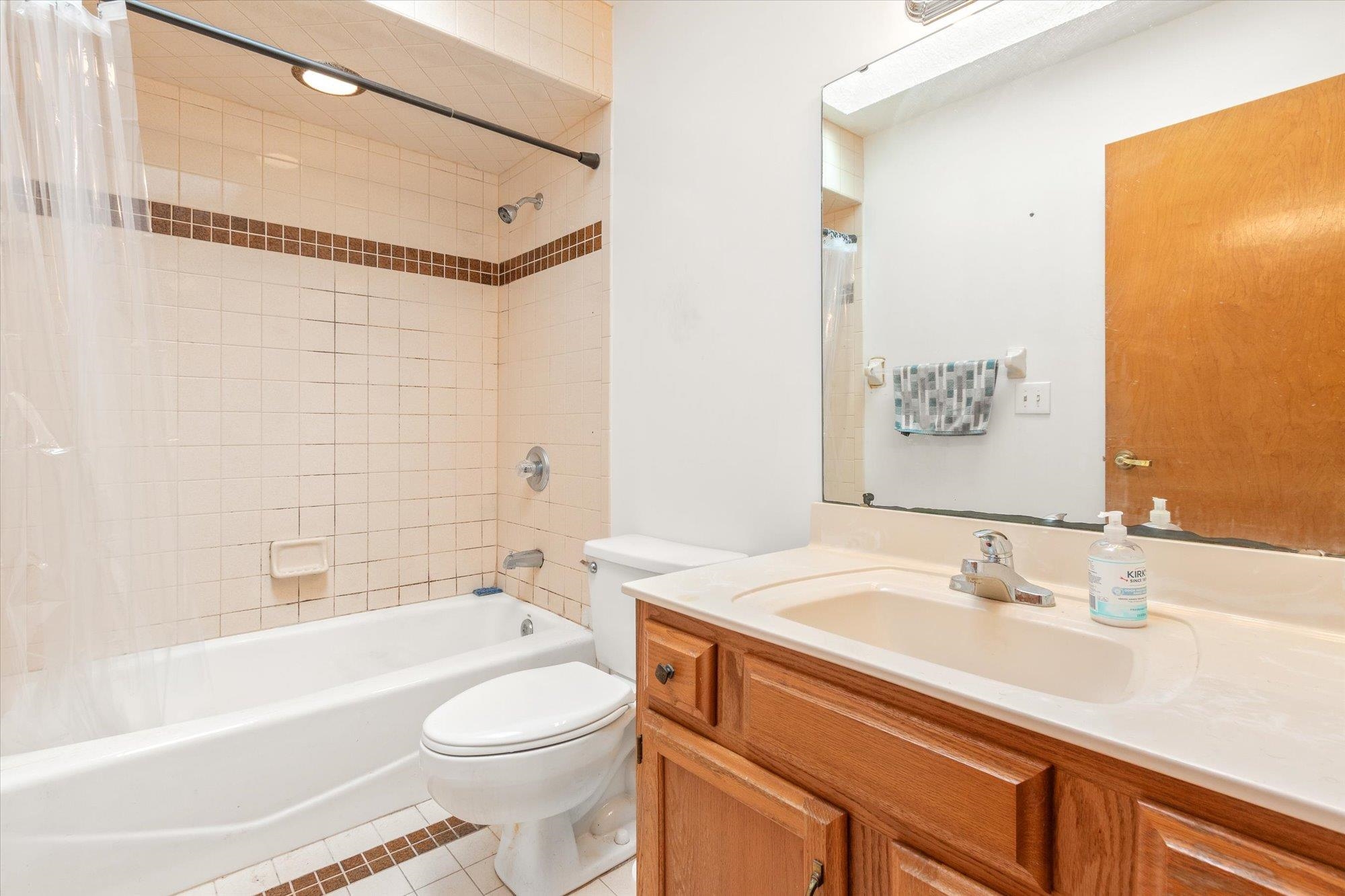 913 Chippewa Street St. Augustine, FL 32086 - Photo 37 of 56 a bathroom with a sink a toilet and shower