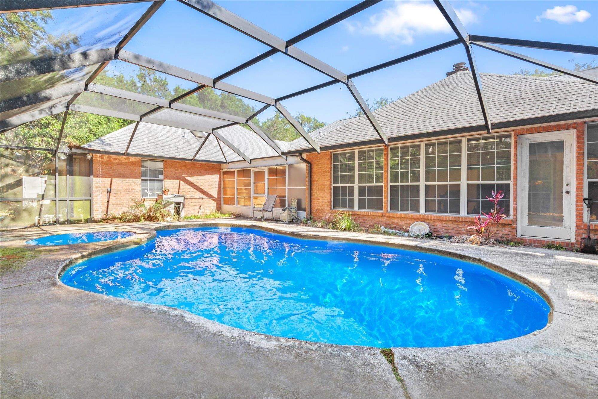 913 Chippewa Street St. Augustine, FL 32086 - Photo 44 of 56 a view of swimming pool with outdoor seating