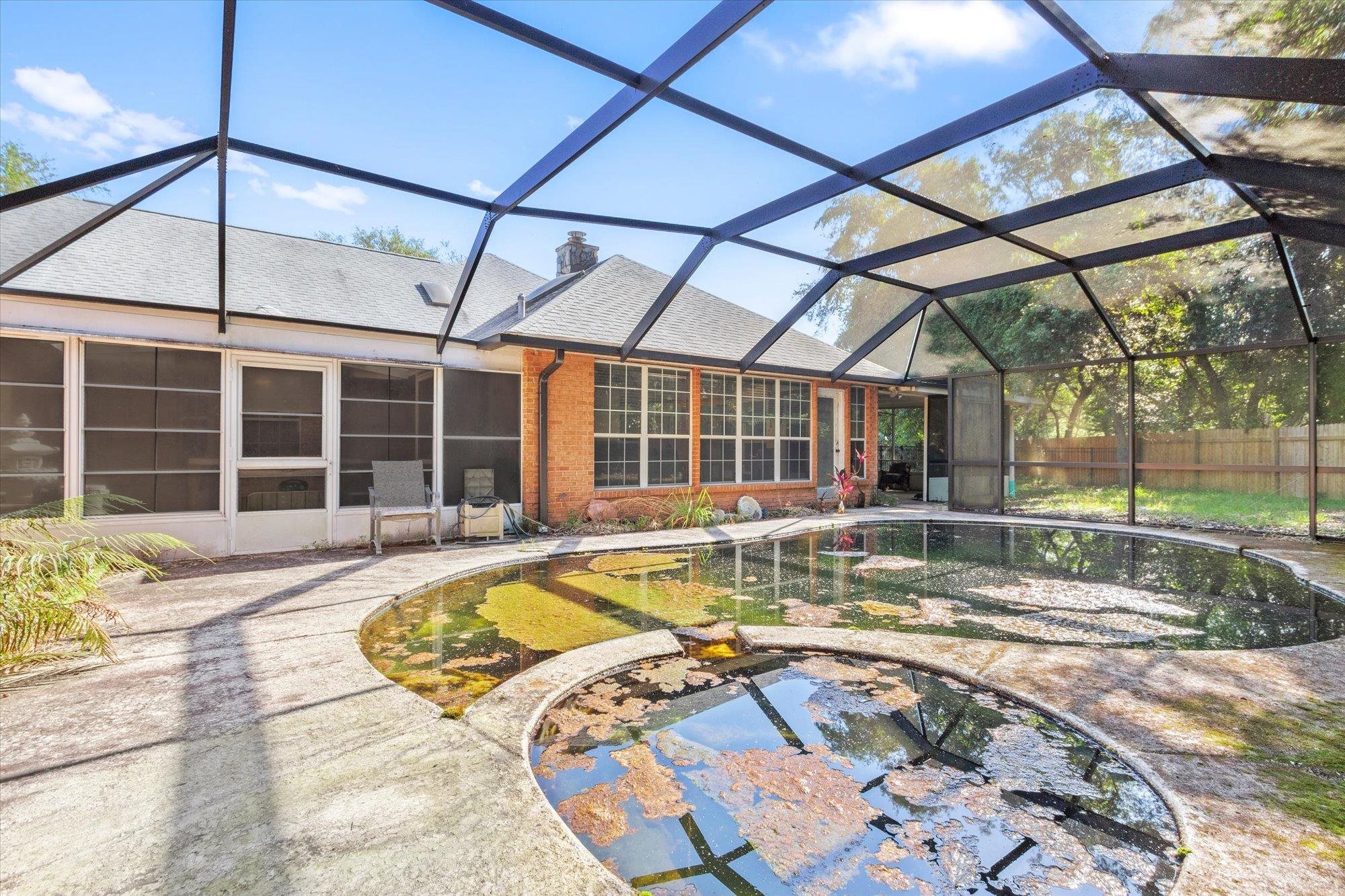 913 Chippewa Street St. Augustine, FL 32086 - Photo 45 of 56 a view of a house with swimming pool in front of it