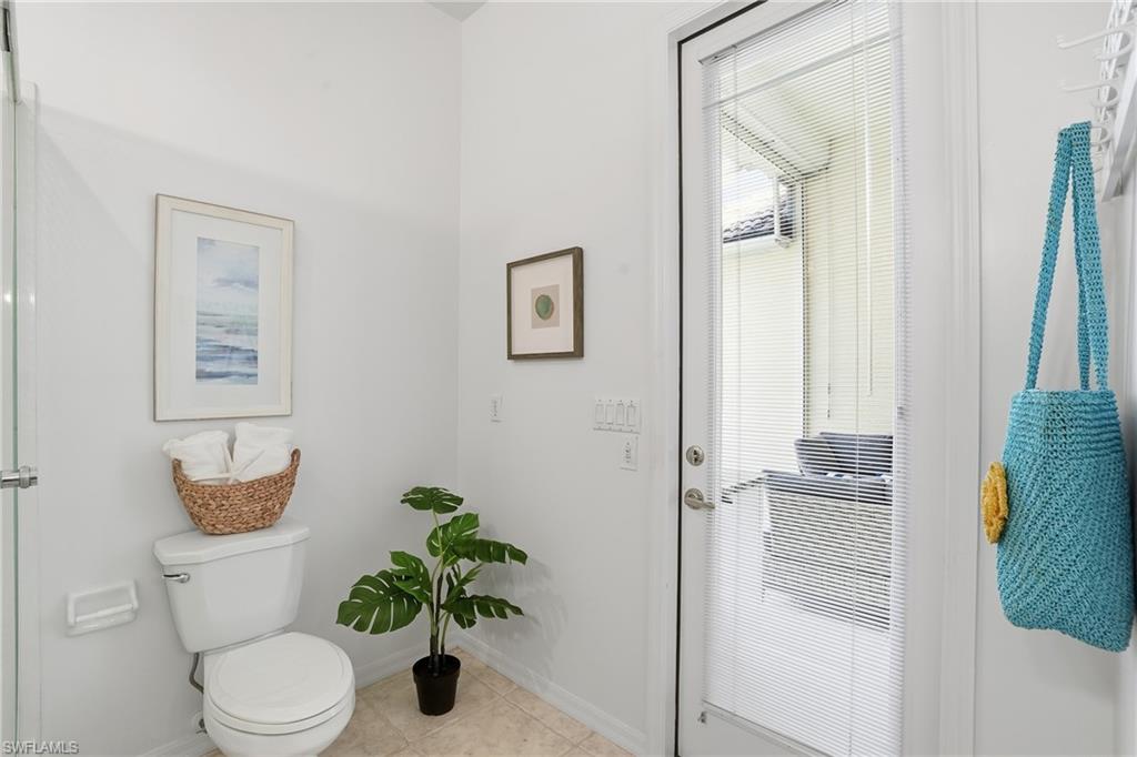 1737 Marsh Run Naples, FL 34109 - Photo 16 of 45 a bathroom with a toilet and a shower