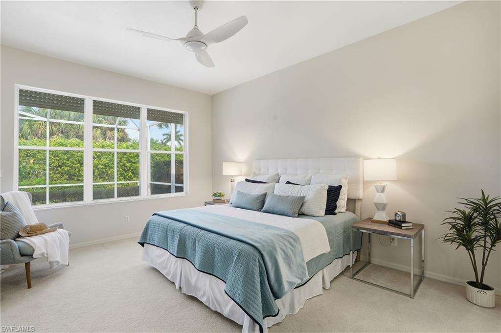 1737 Marsh Run Naples, FL 34109 - Photo 17 of 45 a bedroom with a bed and a window