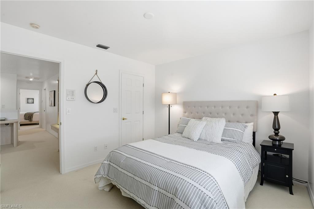 1737 Marsh Run Naples, FL 34109 - Photo 31 of 45 a bedroom with a bed and window