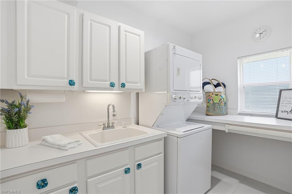 1737 Marsh Run Naples, FL 34109 - Photo 32 of 45 a bathroom with a sink and a mirror
