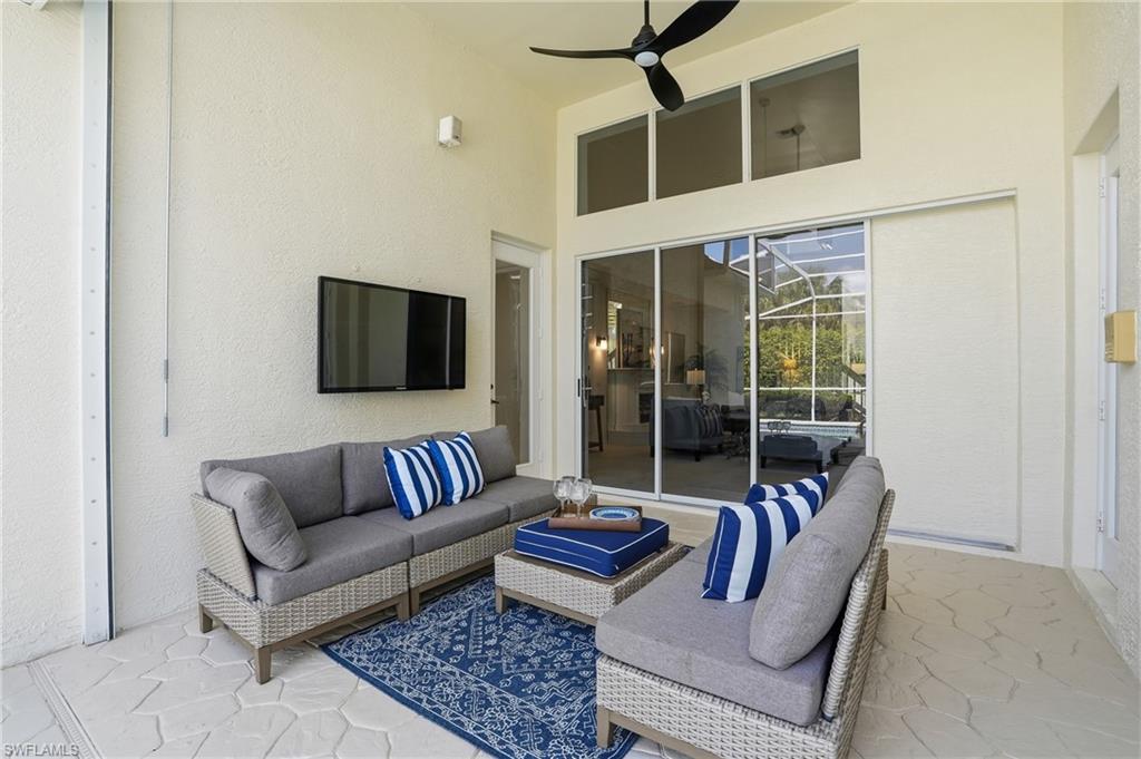 1737 Marsh Run Naples, FL 34109 - Photo 33 of 45 a outdoor living space with furniture and a potted plant