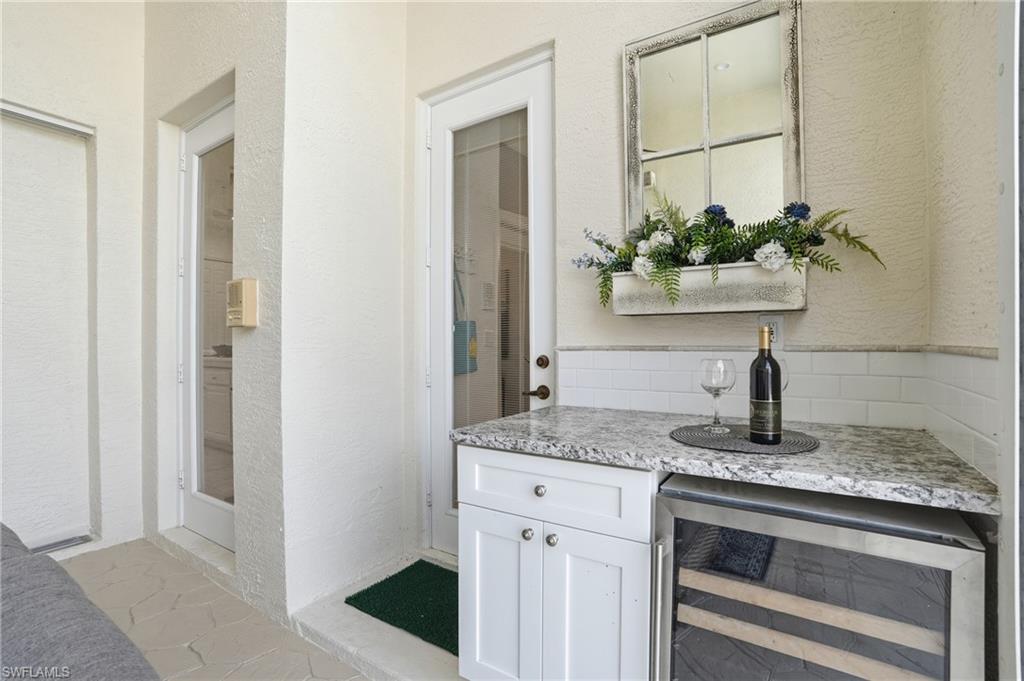 1737 Marsh Run Naples, FL 34109 - Photo 34 of 45 a bathroom with a sink and a mirror