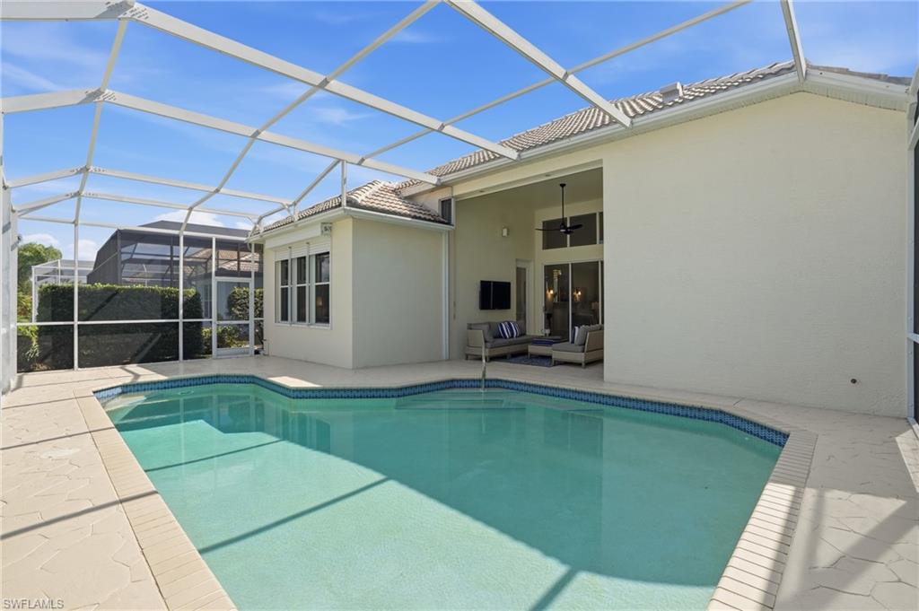 1737 Marsh Run Naples, FL 34109 - Photo 38 of 45 a view of a backyard with a patio