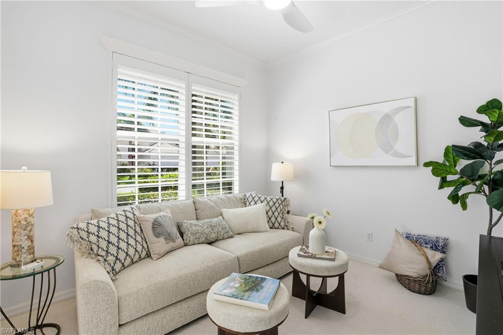 1737 Marsh Run Naples, FL 34109 - Photo 4 of 45 a living room with furniture and a large window