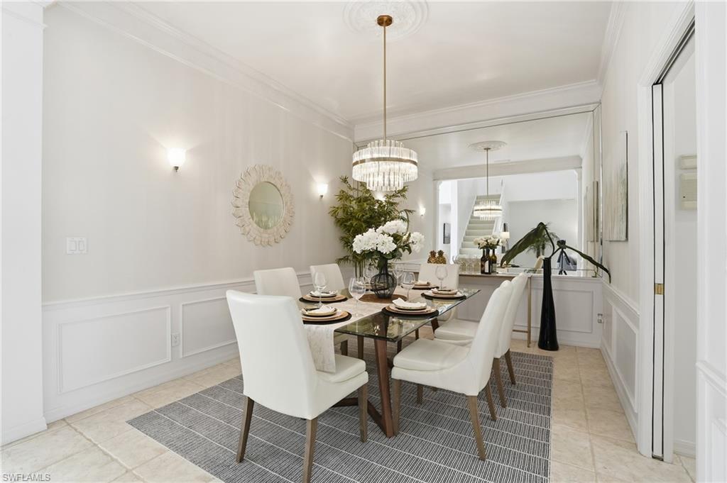 1737 Marsh Run Naples, FL 34109 - Photo 8 of 45 a dining room with furniture and window