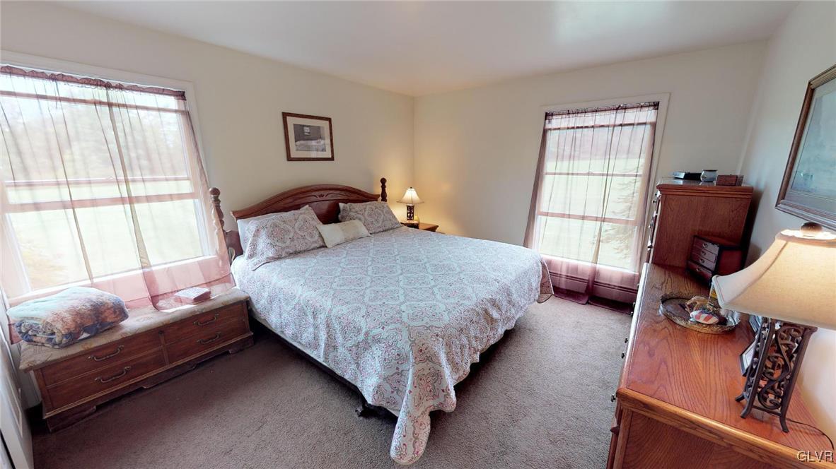 1740 Plains Road Pennsburg, PA 18073 - Photo 24 of 30 a bed room with a bed and a window