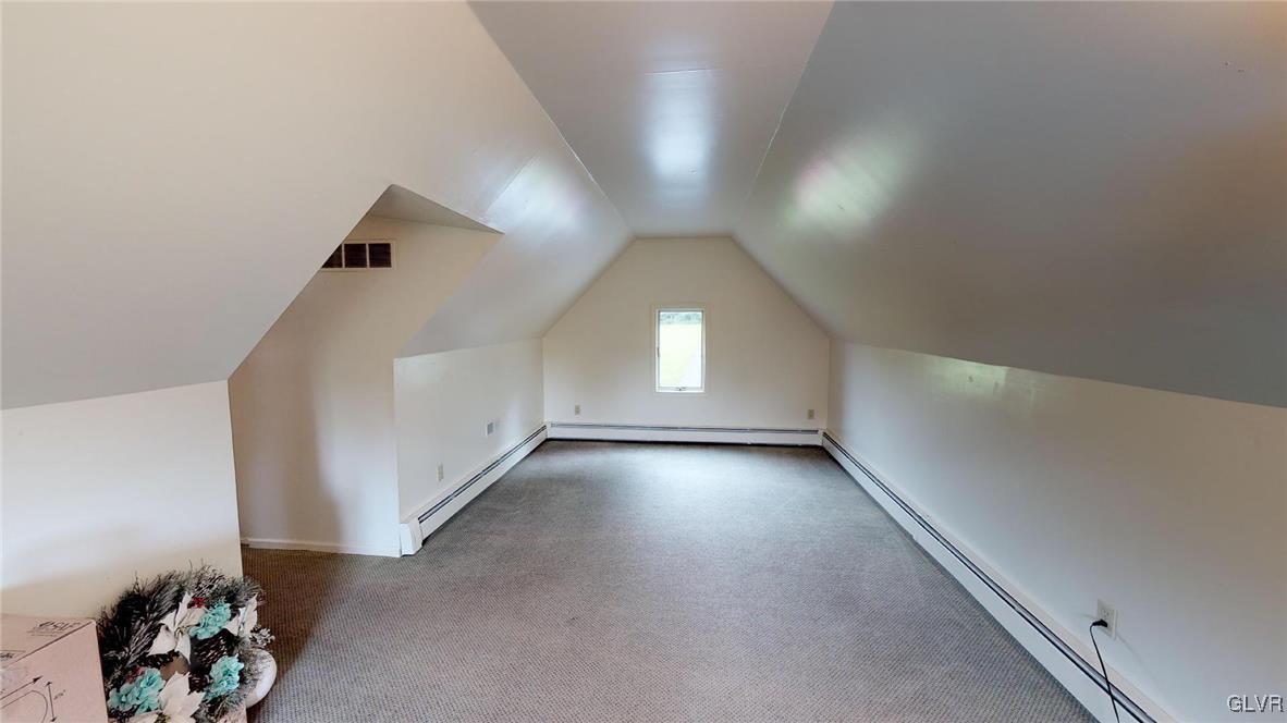1740 Plains Road Pennsburg, PA 18073 - Photo 27 of 30 an empty room with wooden floor and windows