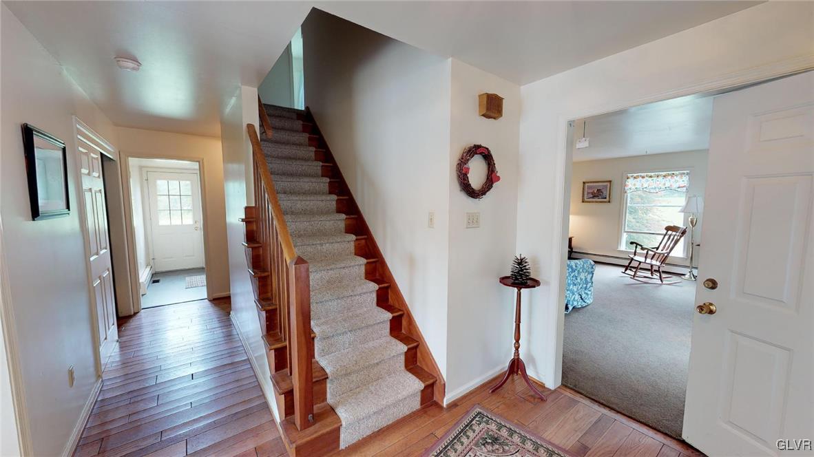 1740 Plains Road Pennsburg, PA 18073 - Photo 8 of 30 a view of entryway and hall with wooden floor