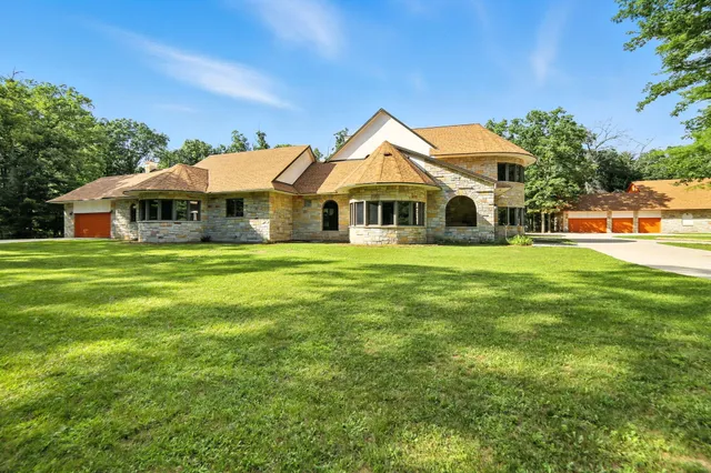 $995,000 | 2404 West 10 1/2 Mile Road, Irons, MI 49644