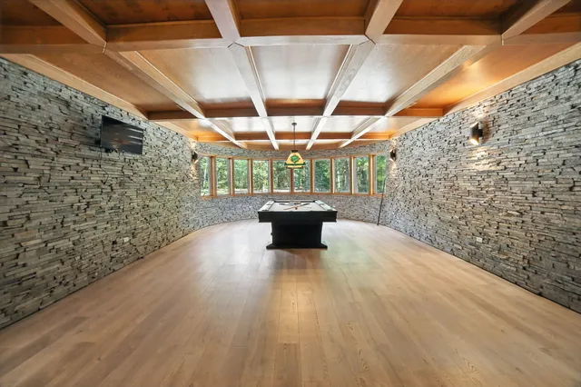 $995,000 | 2404 West 10 1/2 Mile Road, Irons, MI 49644