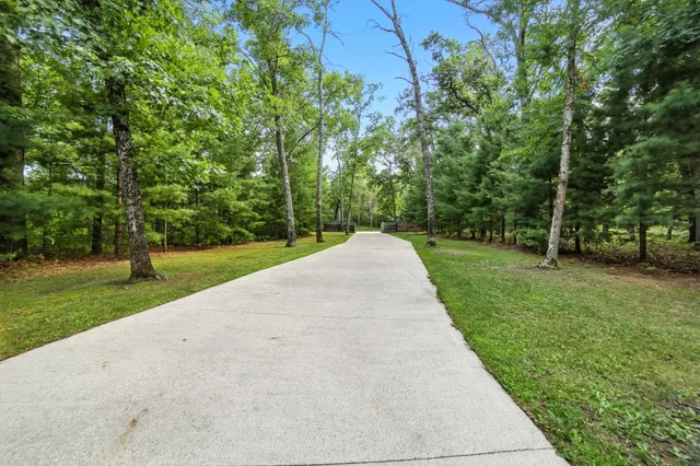 $995,000 | 2404 West 10 1/2 Mile Road, Irons, MI 49644