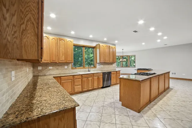 $995,000 | 2404 West 10 1/2 Mile Road, Irons, MI 49644